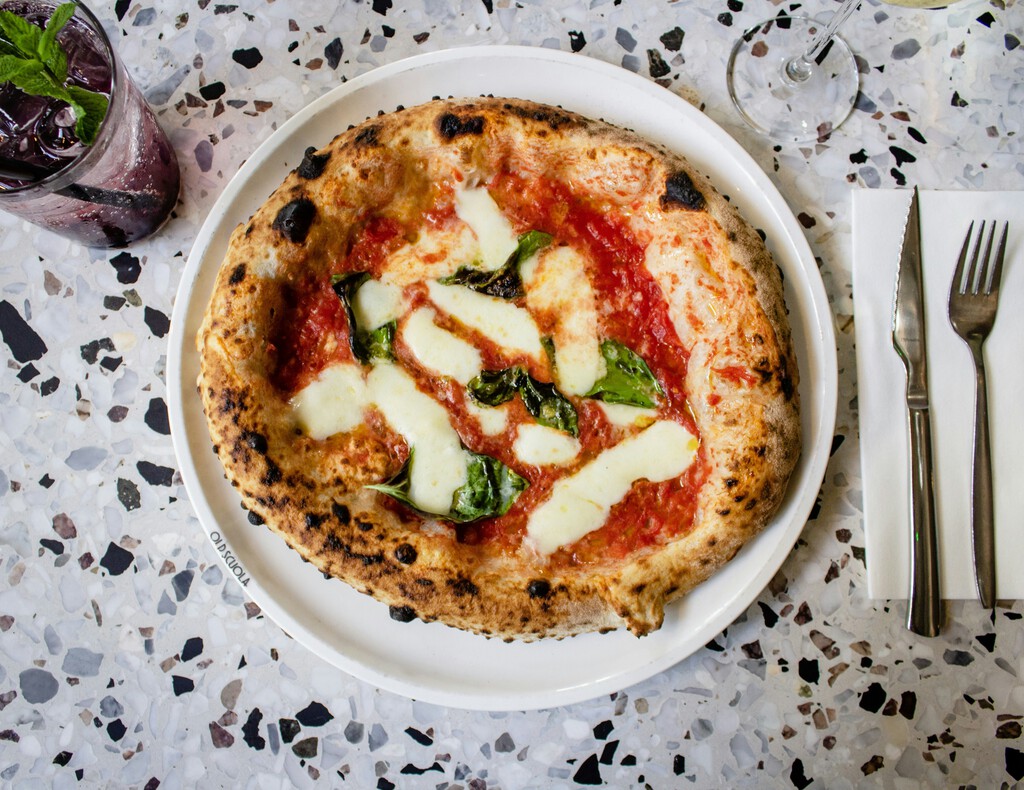 Científicos Revelan el Secreto Físico de la Pizza Perfecta en Hornos de Leña